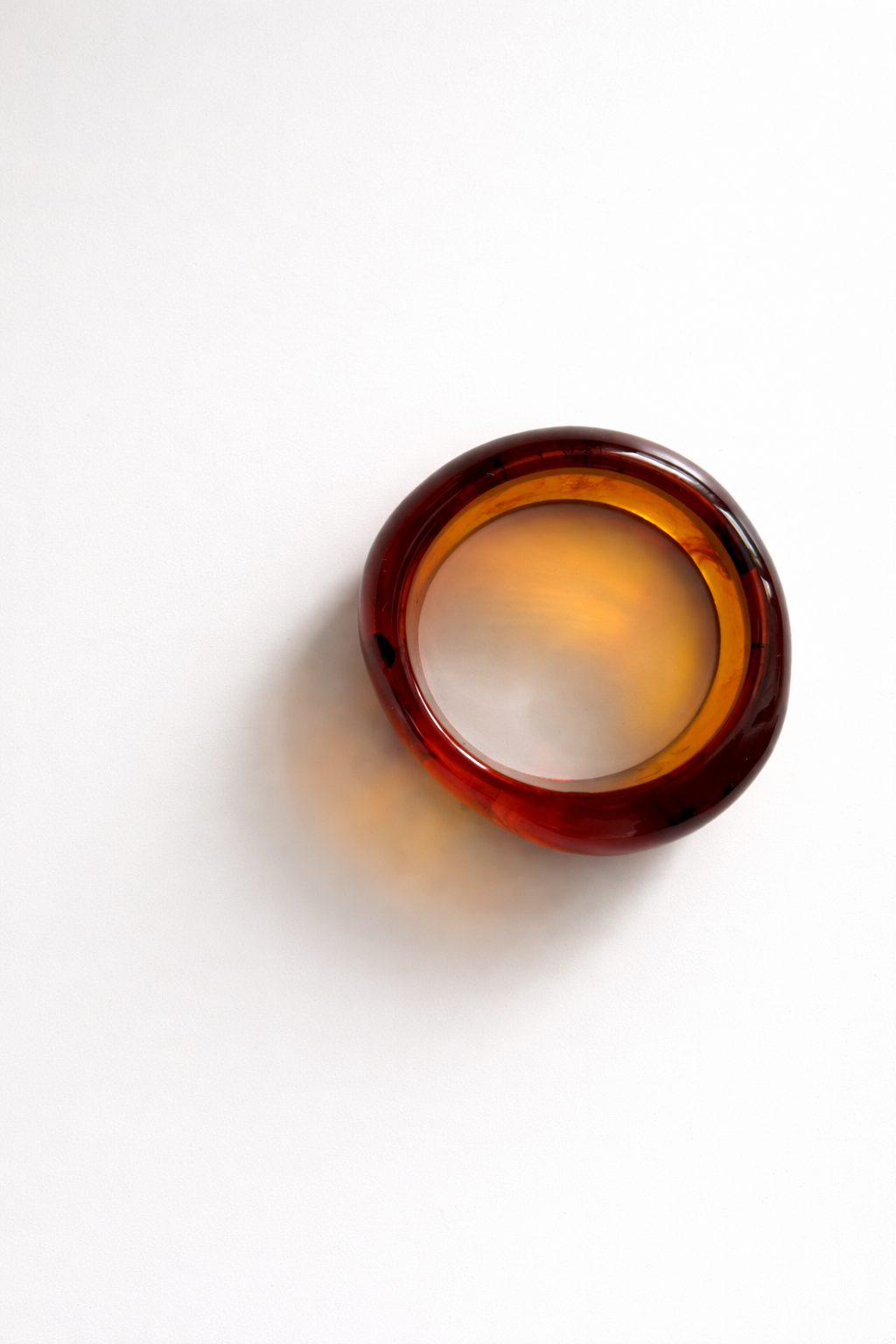 Brown ring on a white background