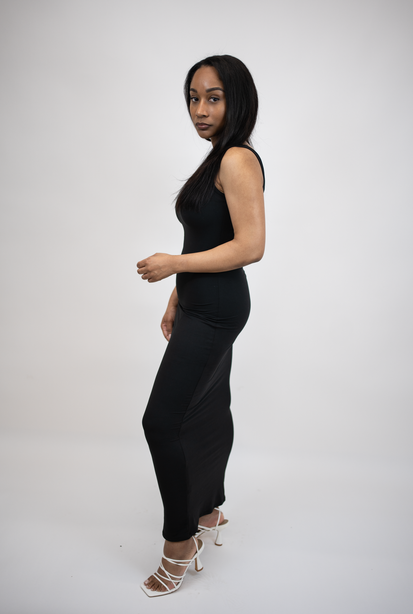 Side of fitted black maxi dress