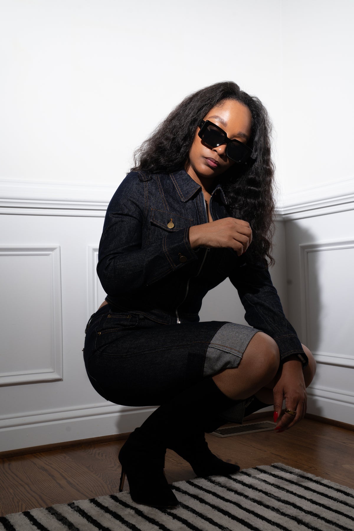 Styled studio portrait of the indigo cuffed-hem pencil skirt matching set