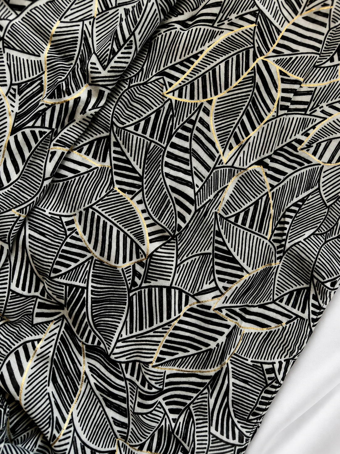 Black and white geometric leaf pattern scarf texture